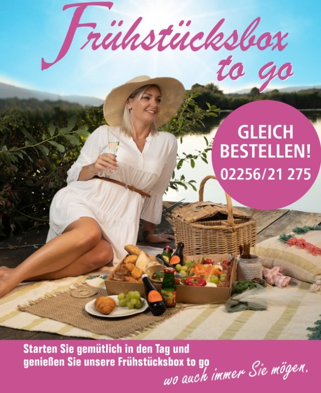 Flyer „Frühstücksbox to go – gleich bestellen: 02256/21 275“: Frau beim Picknick mit Frühstückskorb